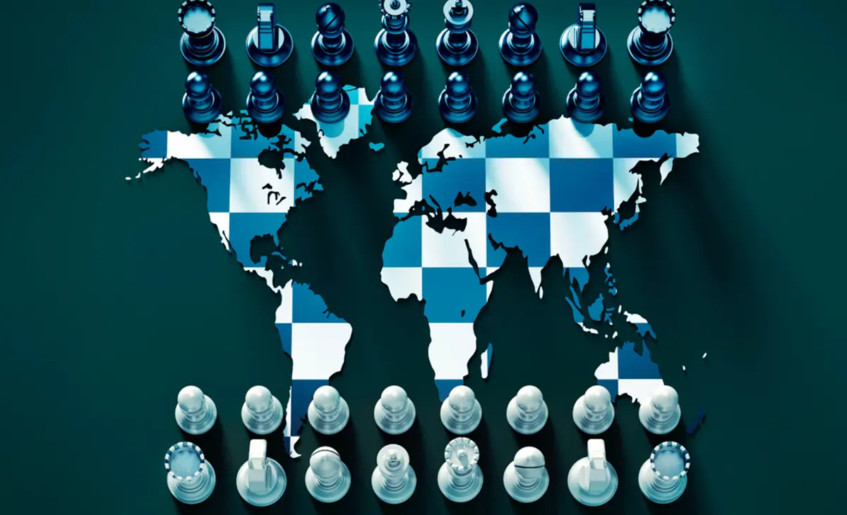 Global chess strategy: world map as a blue-and-white checkered board surrounded by chess pieces.